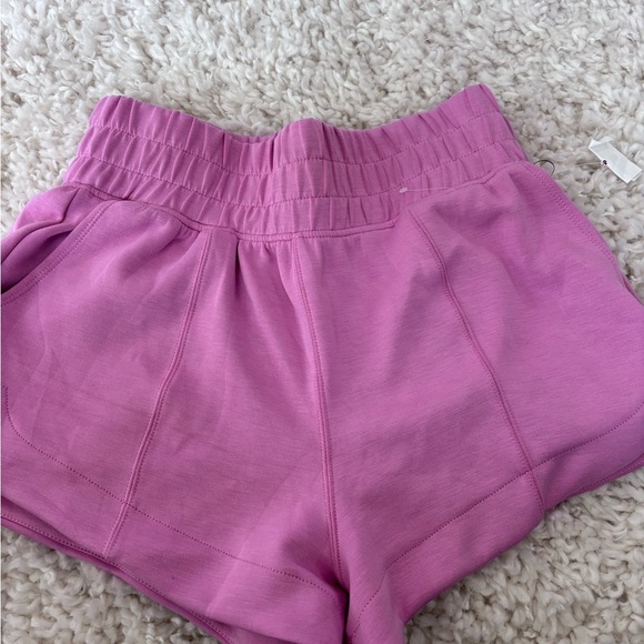 Pink Athletic Shorts with Elastic Waistband and Dolphin Hem - Picture 2 of 3